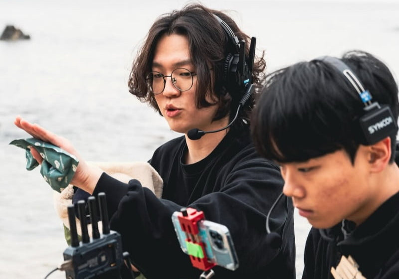 Why do directors wear headphones? 5 reasons behind the scenes