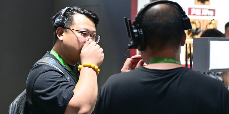 How do referees communicate in football?